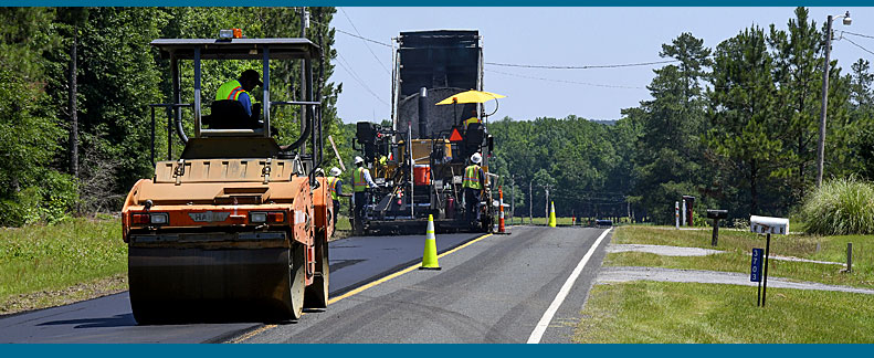 SCDOT paving a two lane road as part of the SCDOT pavement improvement program